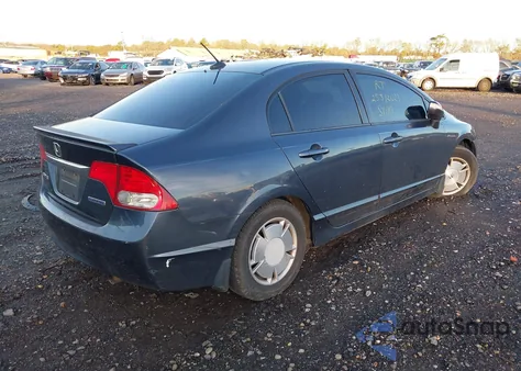 2010 Honda Civic Hybrid из США, поврежденный, VIN JHMFA3F27AS004875